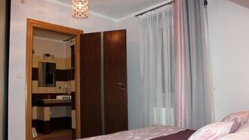 Фото номера Апартаменты с видом на сад Апартаменты Koralia Domki i Apartamenty г. Сарбиново 4
