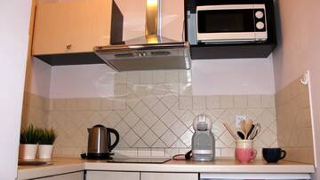 Фото номера Апартаменты с видом на сад Апартаменты Koralia Domki i Apartamenty г. Сарбиново 8